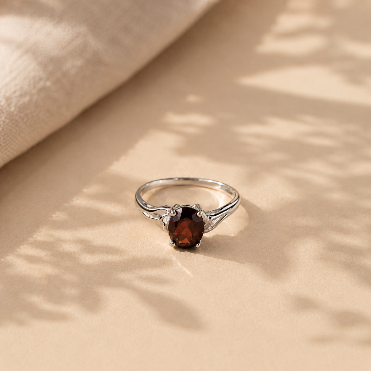 Oval Garnet Solitaire Ring