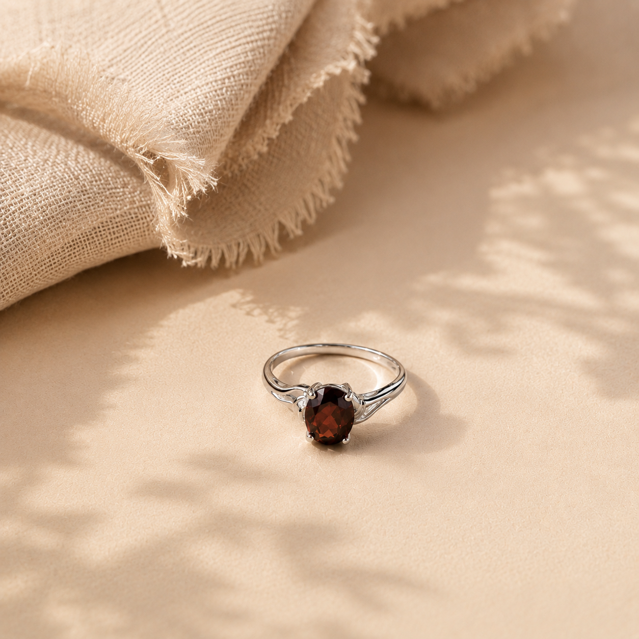 Oval Garnet Solitaire Ring