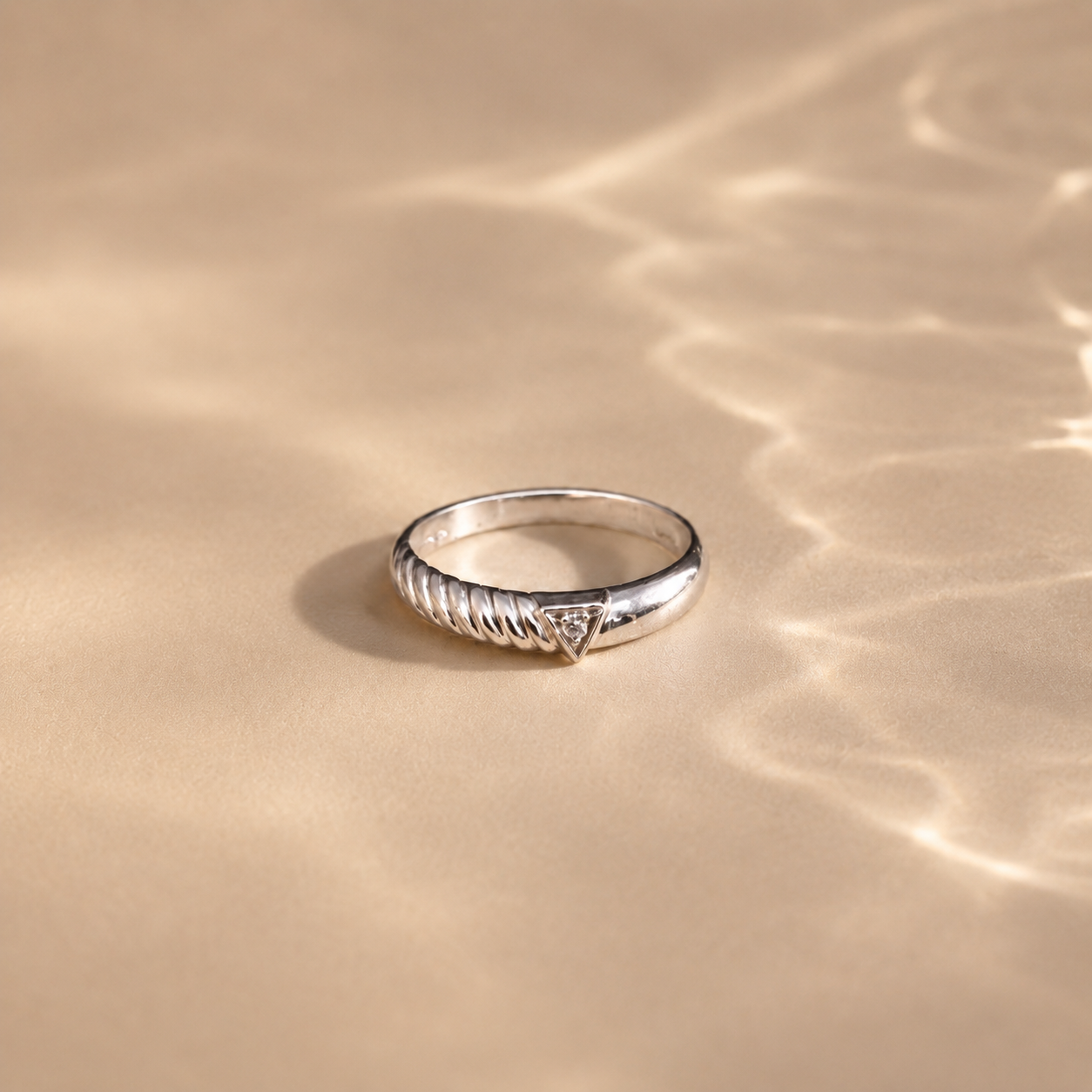 Twisted Triangle Solitaire Ring