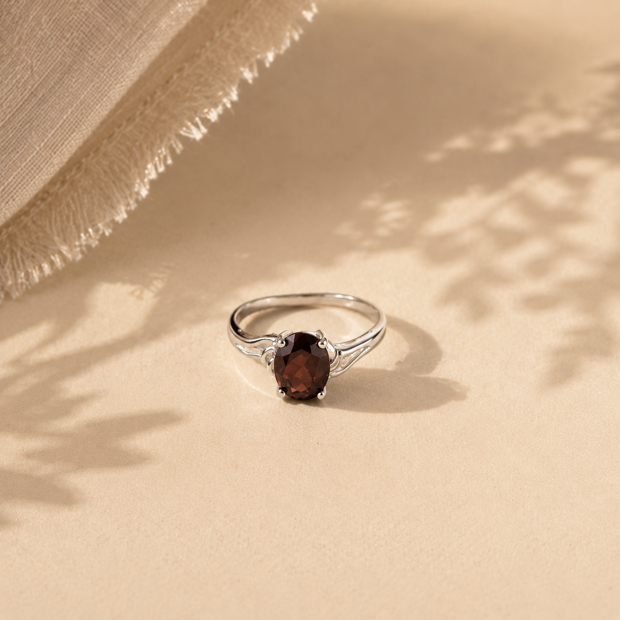 Oval Garnet Solitaire Ring