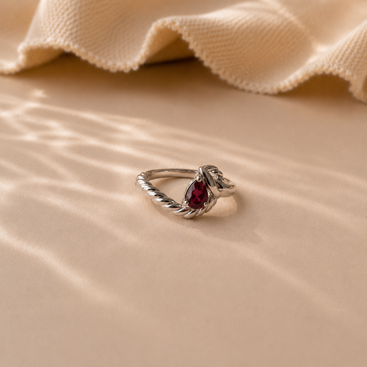 Pear Garnet Twist Ring