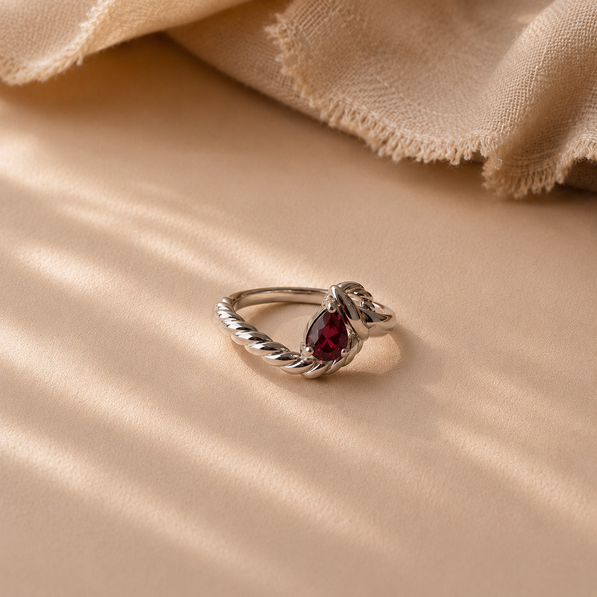 Pear Garnet Twist Ring