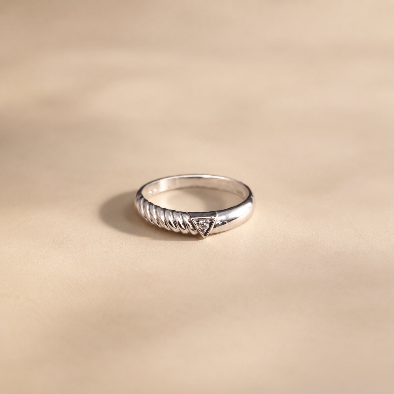 Twisted Triangle Solitaire Ring
