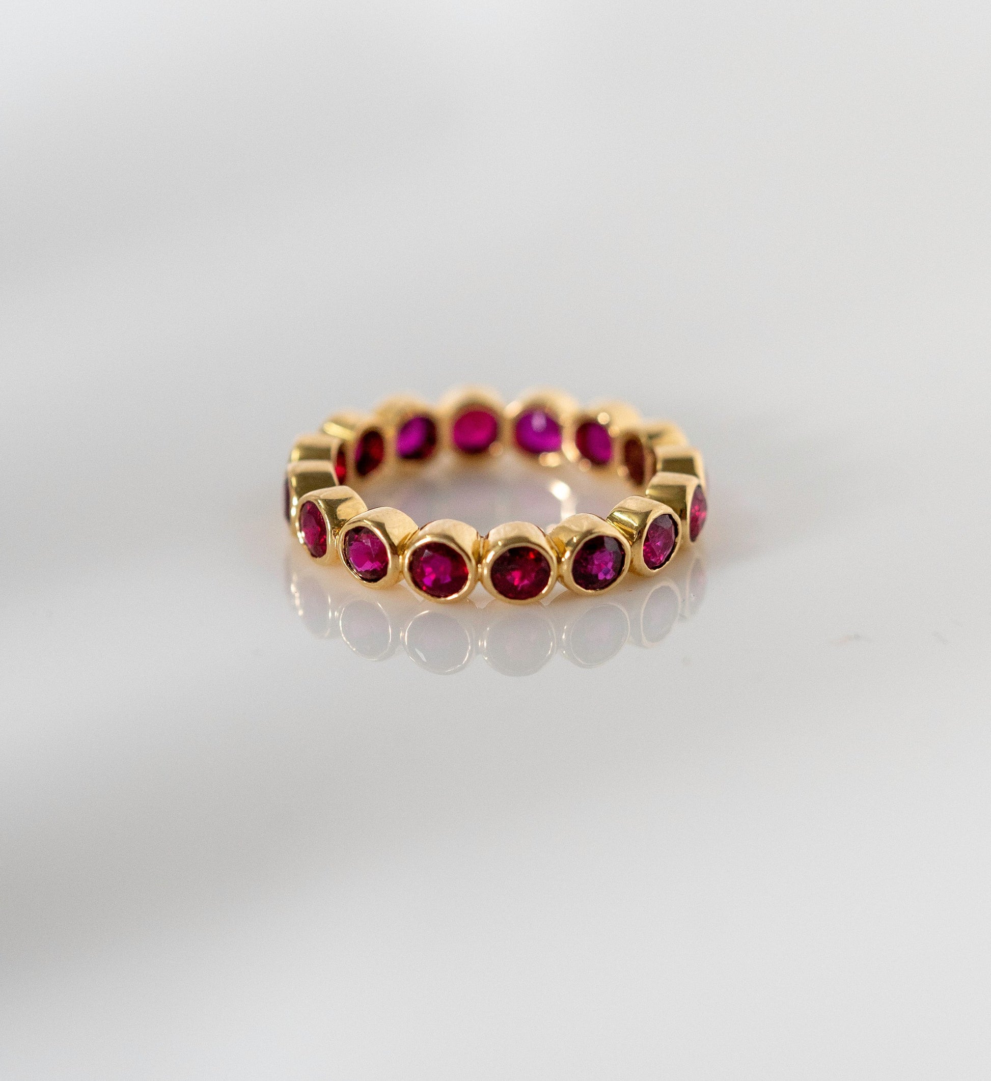 Ruby Bezel Eternity Ring Yellow Gold