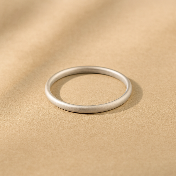 Thin 2mm matte finish ring in sterling silver for everyday wear